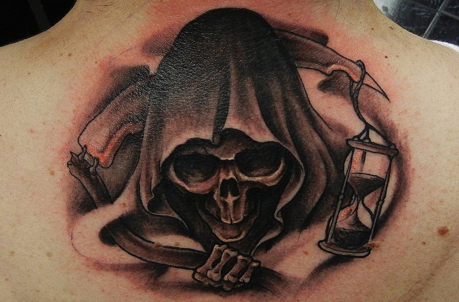8. Skull and Grim Reaper Tattoos - wide 6