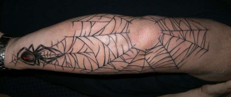 spider web tattoo on elbow for men