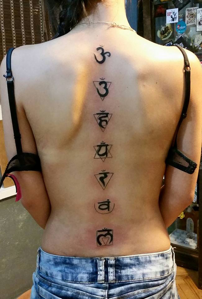 Chakra tattoos on back