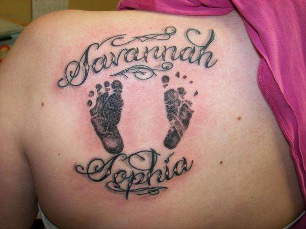 savannah-sophia-black-ink-footprints-tattoo-on-left-back-shoulder