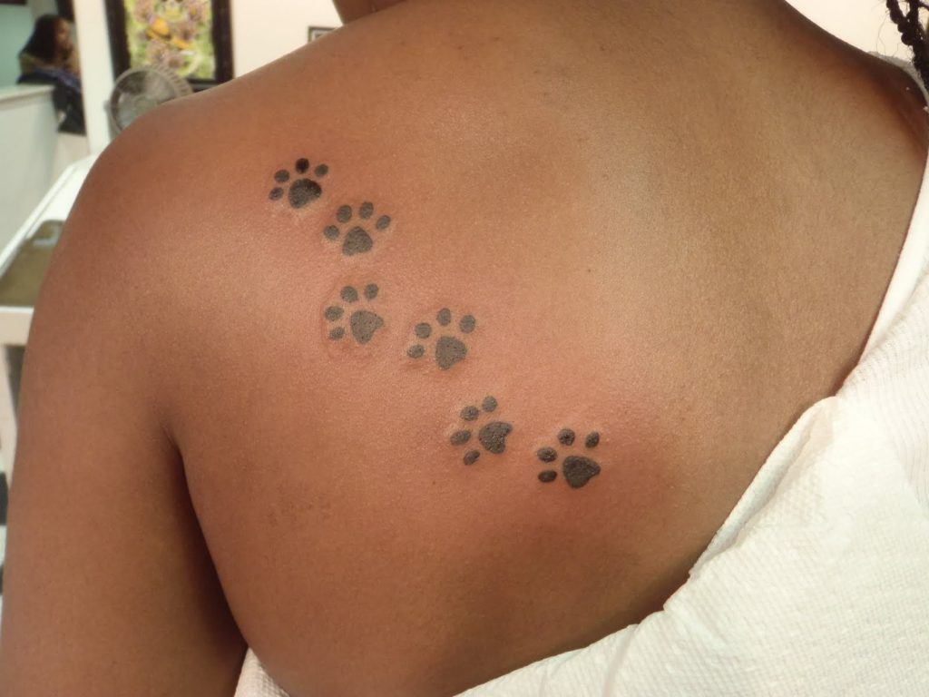 4. Cat Paw Tattoo Meaning - wide 3