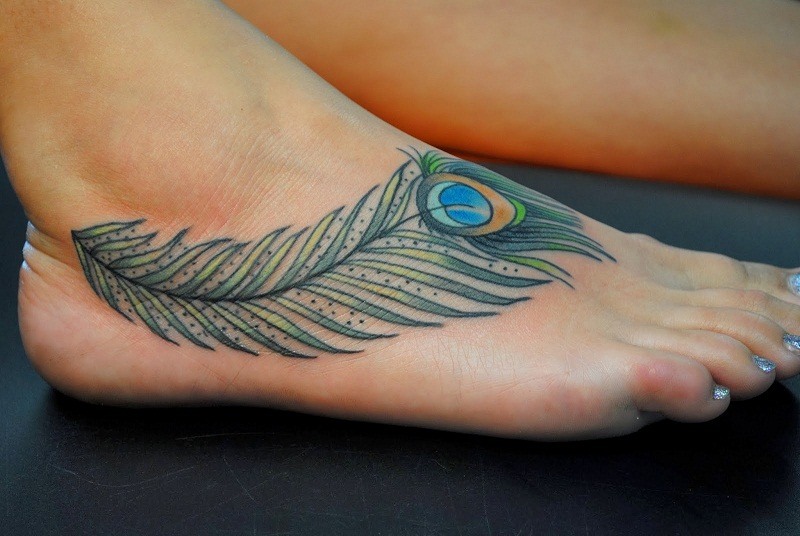 20 Peacock Feather Tattoos And The Beautiful Meanings Behind Them -  TattoosWin
