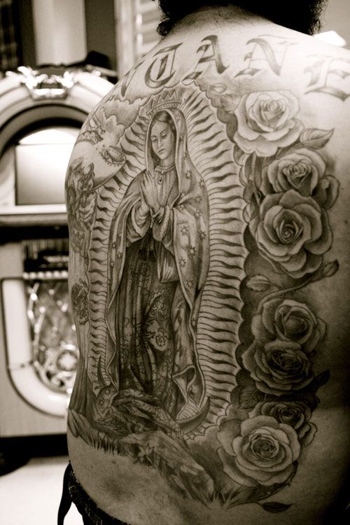 Black and Grey Virgin Mary with Rose tattoo by Dimas Reyes TattooNOW
