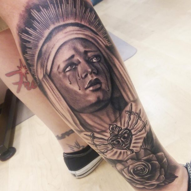 41 Virgin Mary Tattoos With Religious Connections and Meanings - TattoosWin