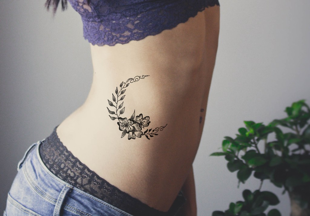 Beautiful Crescent Moon Tattoo on Belly.