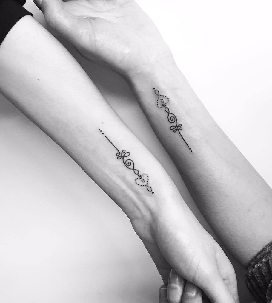 Unalome with heart tattoo for couple.