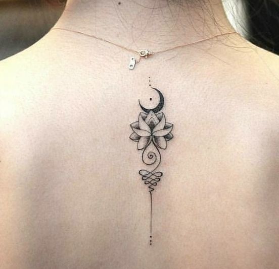 Unalome with lotus and crescent moon tattoo on back.