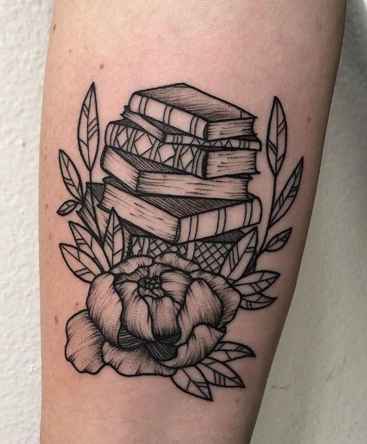 Stack Of Books With Flower and Leaves Tattoo.