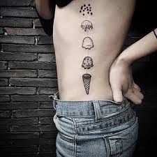 Ice Cream tattoo on side of a girl