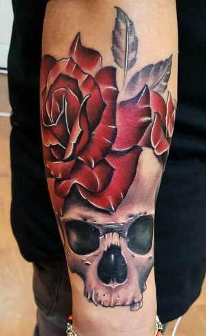 Rose And Skull Tattoo On Forearm