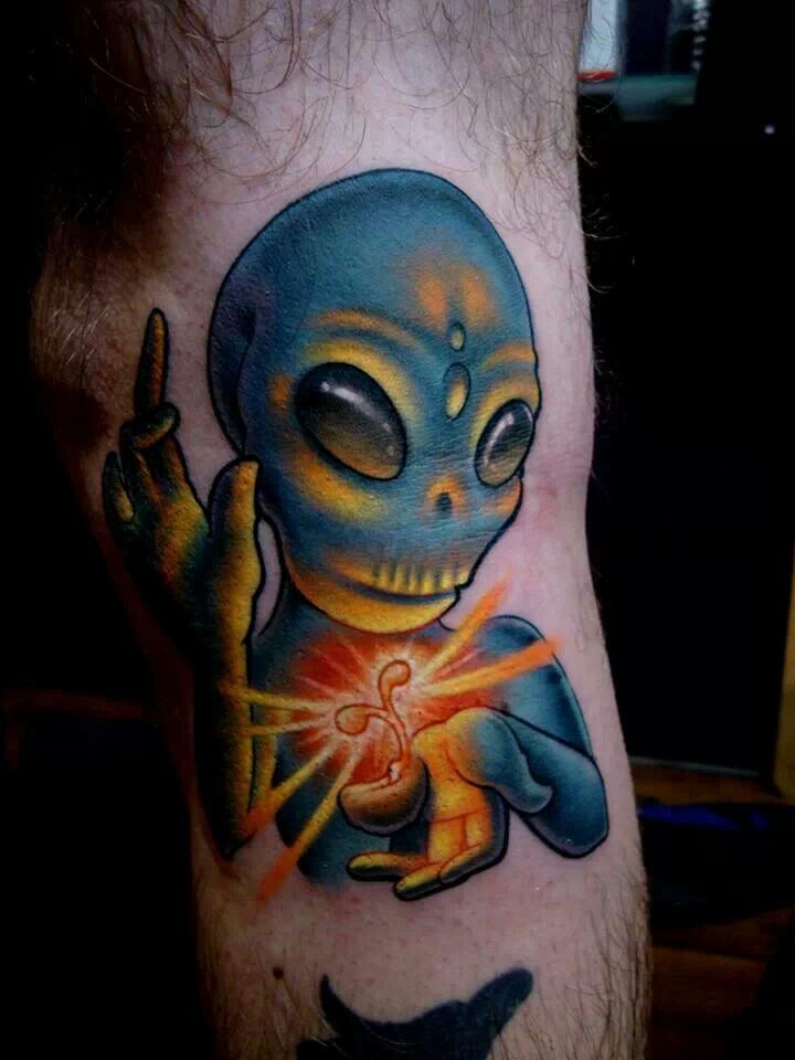 Alien tattoo on Leg