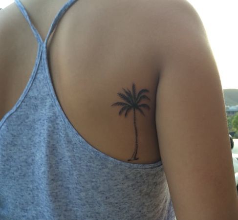 Palm Tree Tattoo On Back Side Of A Girl