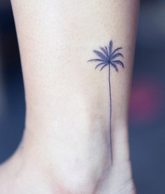 Palm Tree Tattoo on leg.
