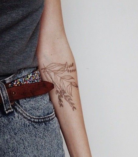Plant Tattoo On Forearm Of A Girl