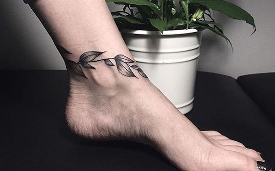 Vine Plant Tattoo On Ankle Of A Girl