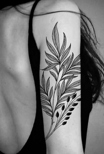 Plant Tattoo On Hand Of A Woman