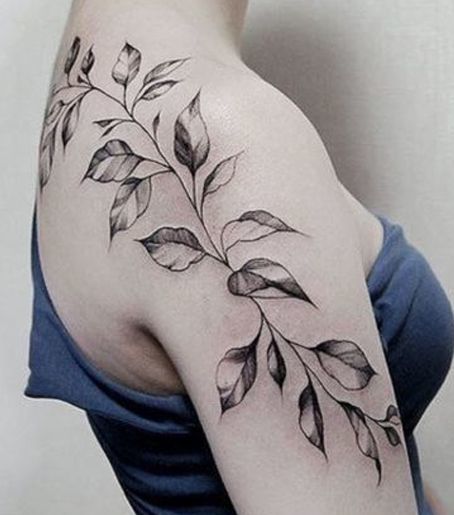 Vine Plant Tattoo On Back and Shoulder Of A Woman