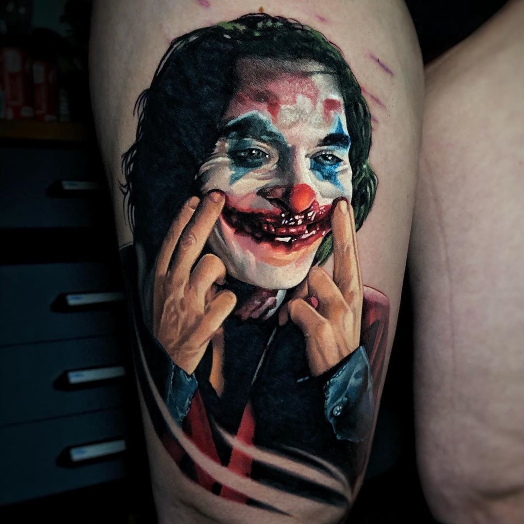 The best tattoos with Joaquin Phoenixs Joker  iNKPPL  Joker tattoo Back  tattoos for guys Tattoos