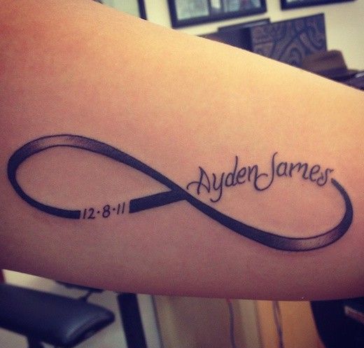 Infinity Symbol Tattoo With Date And Name Written On It.