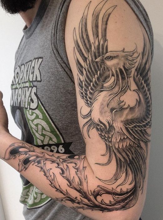 Phoenix Tattoo on shoulder of a man.