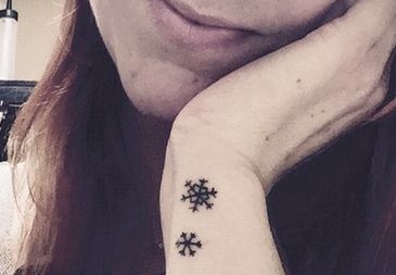 Snowflake Tattoo on wrist.