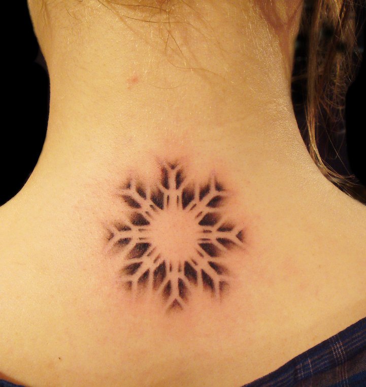 Snowflake Tattoo on neck with negative effect.