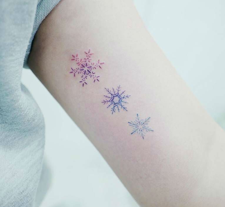 Snowflake Tattoo on hand.