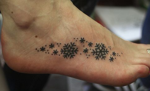 Snowflake Tattoo On Leg.