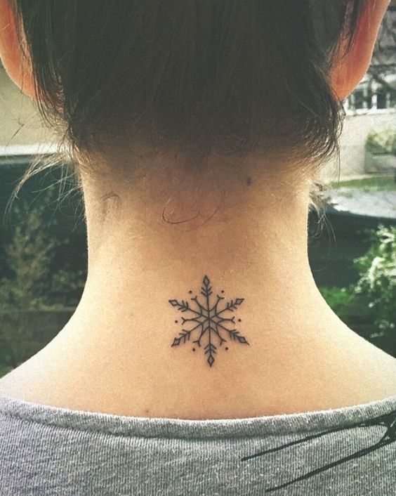 Snowflake Tattoo on neck.