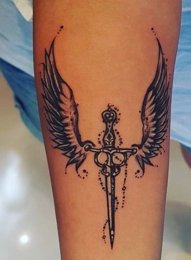 Power Represented By Sword Wings Tattoo.