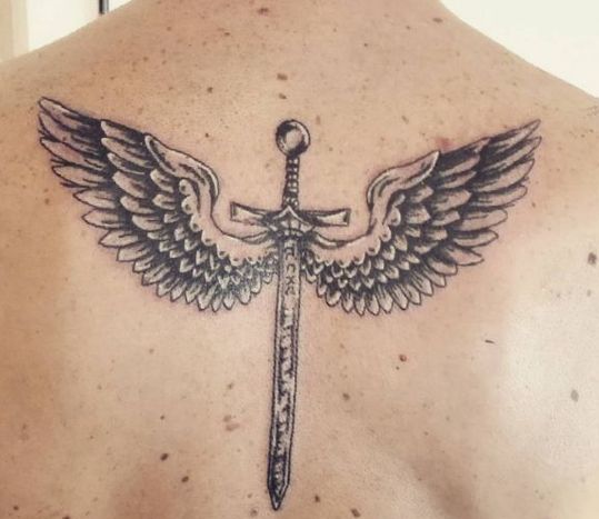 Sword Wings Tattoo On Back Representing Power.