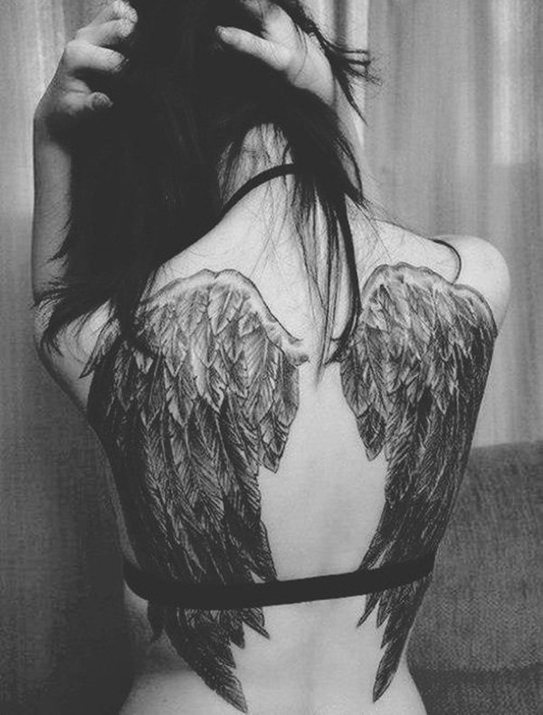 Wings Tattoo On Back Of A Woman