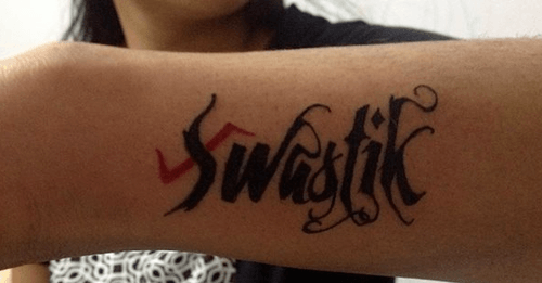 Swastik Tattoo on forearm