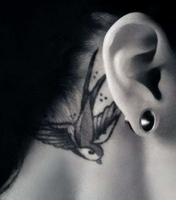 Swallow Tattoo behind the ear