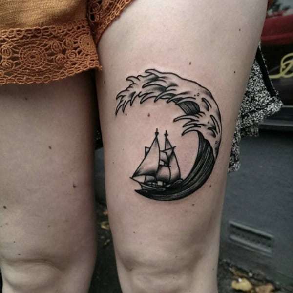 Wave Tattoo with boat on thigh for women