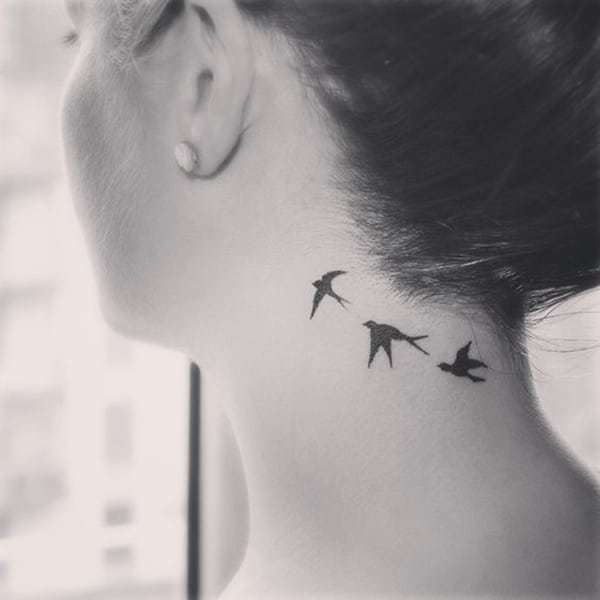 Swallow Tattoo on neck
