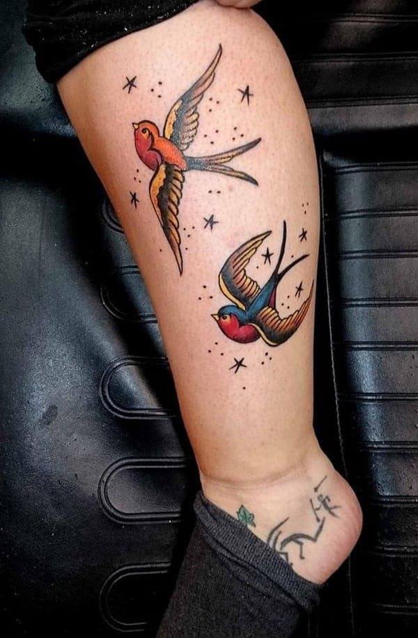 Colorful Swallow Tattoo on leg