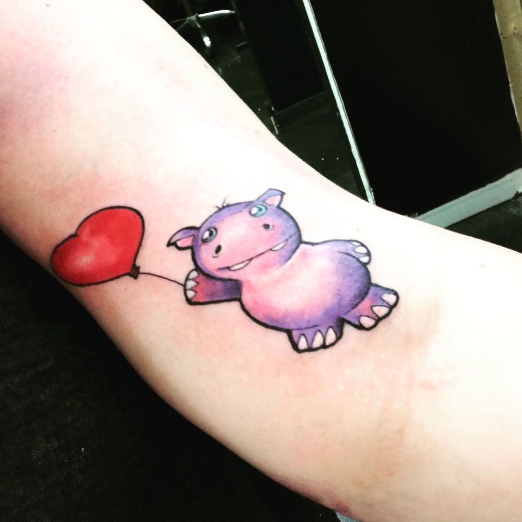 Cute Cartoon Hippo Tattoo on Arm