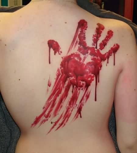 Red  blood Hand tattoo for women at back