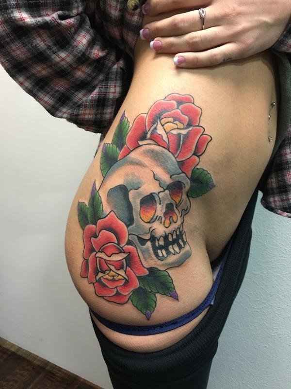 Skull with rose on leg for women