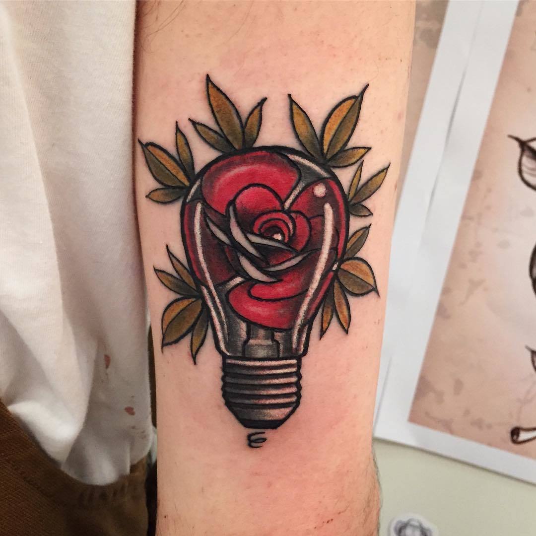 The Meaning Behind The Flower Light Bulb Tattoo.