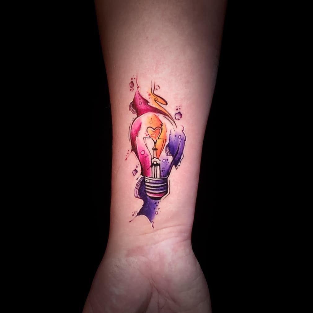 Super cool Light Bulb Tattoo on wrist for female