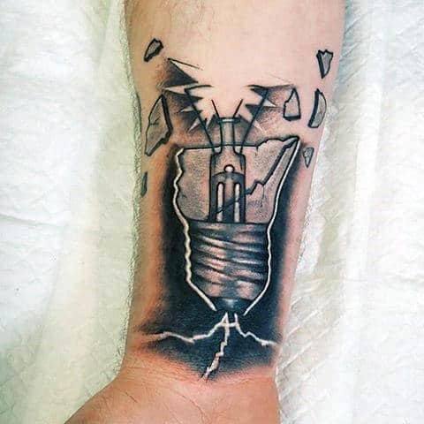 Broken Light Bulb Tattoo on wrist for men.