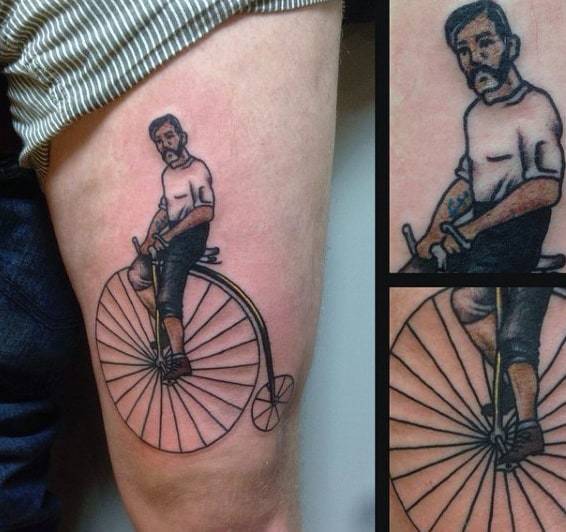 Cycle Tattoo with cartoon on leg for women