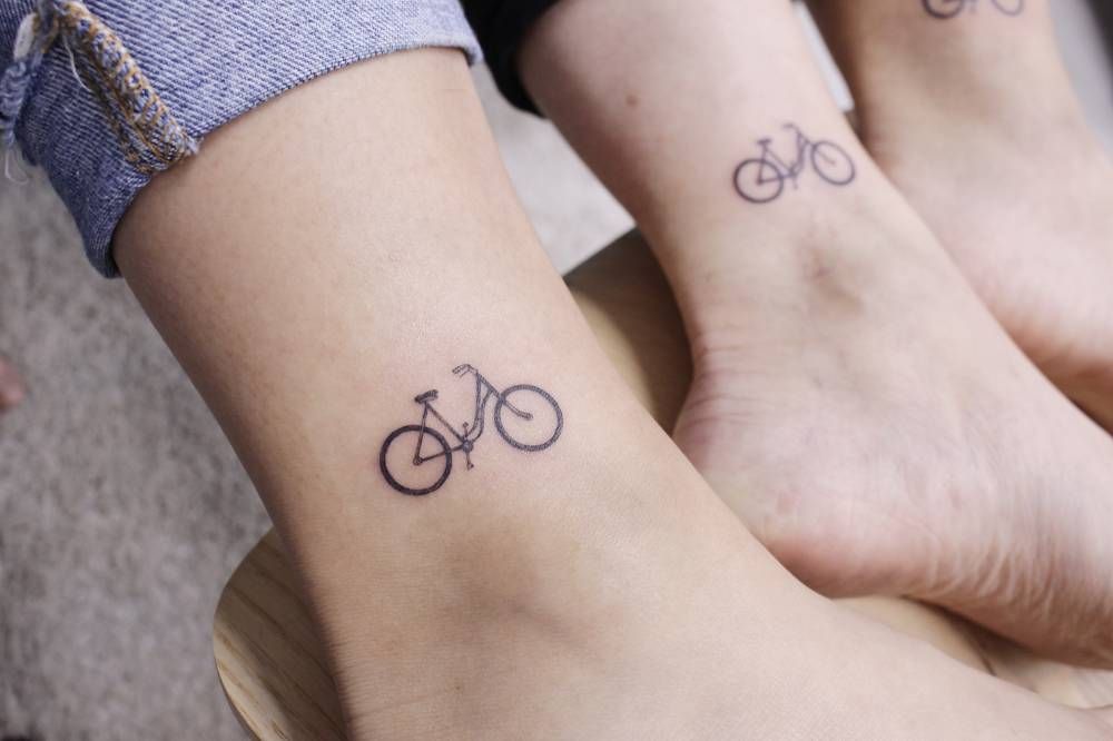 Cute small Cycle Tattoo on ankle for women