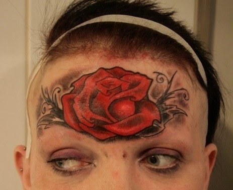 Red Rose tattoo on forehead for girls
