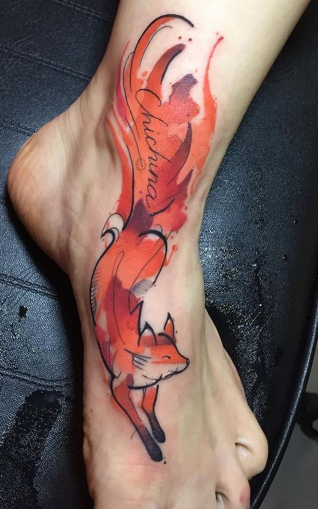 Curled up Fox Tattoo on leg