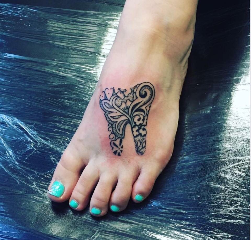 Tooth Tattoo for women on leg