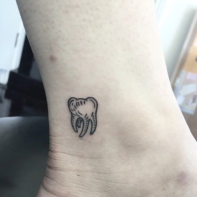Small Tooth Tattoo
