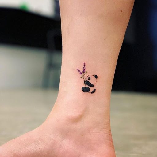 Small Cute panda tattoo on leg for women